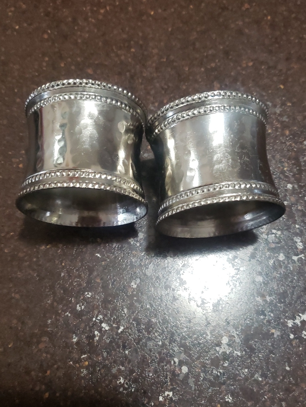 Pair of Sivertobe Metal Hammered Napkin Rings